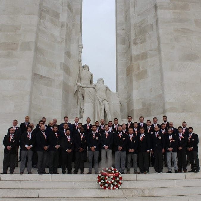 Vancouver Rowing Club rugby touring side at the Vimy Memorial in France, laying a wreath